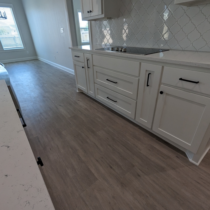 Kitchen island and stove area was painted including the drawers and oven area.