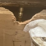 When I cut the subfloor out in the entire section of the middle wall over to the shower wall. I accidentally cut a sliver in the water line for the toilet. So I had to cut the main immediately and cut the copper to attach a shark bite coupling to repair the sliver cut.