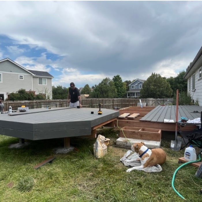 Stairs on both sides going up to first level of deck