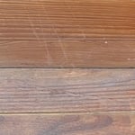 The contrast on a pew, before and after being oiled