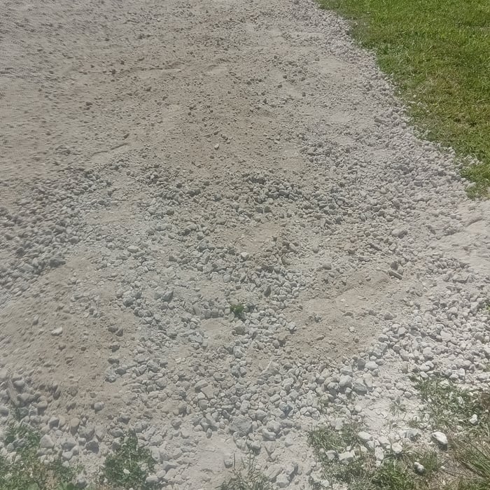 Us laying rock driveway