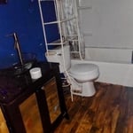 New sink, toilet, tub, flooring, and paint.