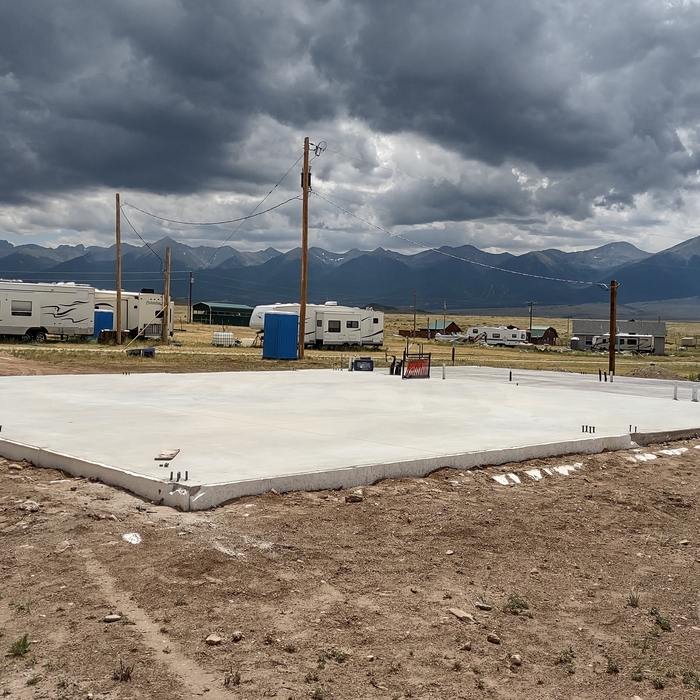 Concrete been poured and ready start erecting steel.