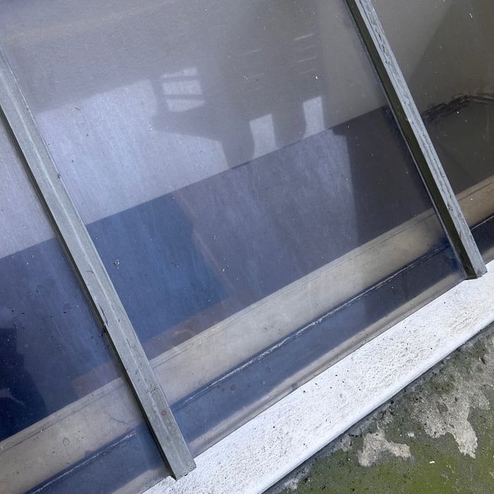 Before the skylights were restored
(Hard water and paint and dirt/grime buildup)