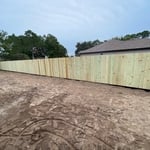 Retaining wall with fence
