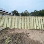 Retaining wall with fence
