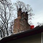 Chimney in the process of being demoed