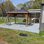 Gazebo and concrete pad leveled and painted