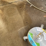 Difference in old concrete to new cleaned concrete featuring surface cleaner