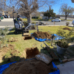 Excavating cesspool, to install new lid and above ground clean out.