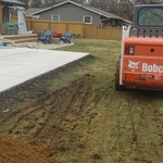 Backfilled dirt for new concrete driveway