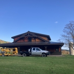 Staining a hunting camp, Cherry Valley, NY