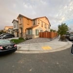 Paver driveway, retaining wall? And redwood fencing