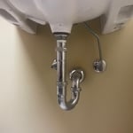 Replaced slow sink drain with new drain pipe.