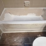 Before photo of a tub that was not refinished correctly