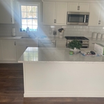 New kitchen cabinets, trim and flooring.
