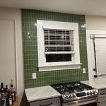Here is the finished product! There is another tile backsplash I installed on the other side of the kitchen