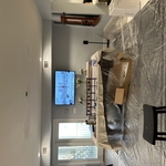 Ceiling painted with patch work and new light installed.