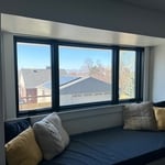 Window seat replacement from single pane glass to modern low profile casement windows in Pella Reserve Contemporary.