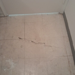 Behind bathroom door before