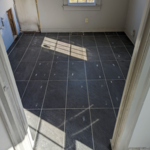 Ceramic tile kitchen area before cabinets installed