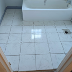 Tiled bathroom after installing new tub