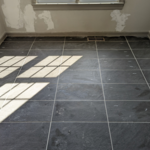 Ceramic tile in dining room area. Both kitchen and dining room ran together without transission strip