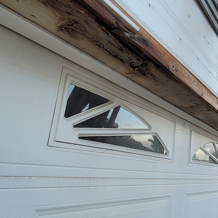 Remove vinal siding and install board and batt