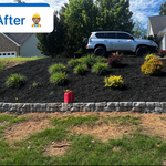 We added black mulch, weed barrier (no more weed problems) and a Windsor wall to top it off and solve the erosion issue. All done in just 1 day.