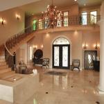 Traditional Entry - Beige Black Iron And Wood Stair Railing