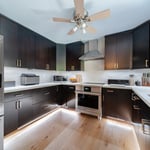 We upgraded their kitchen and now it looks modern, less cluttered and more classy!