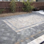 Pool paver deck with retaining and landscape