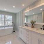 After Picture - New Free standing Tub, Sleek faucet, Double Bowl vanity.