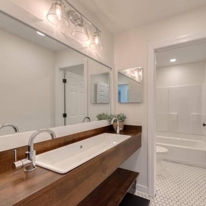 Custom Cabinet & Custom Sink.
Completely demoed and rebuilt from scratch.
New Shower, New toilet, New flooring pattern.