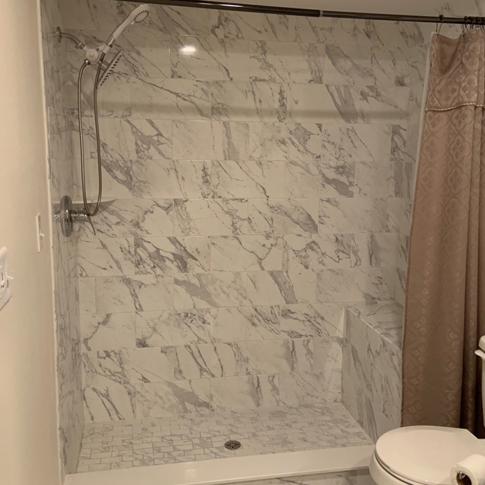 Bathroom shower and floor tiled