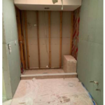 Bathroom shower and floor tiled