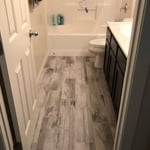 New flooring, vanity, mirrors, trim, baseboard, etc.