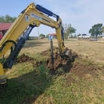 Digging old hydrant up.