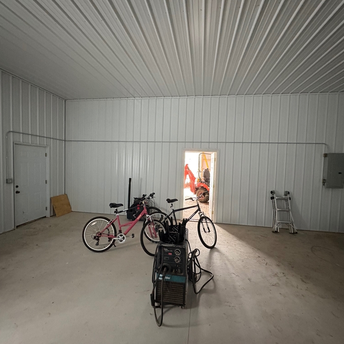 Conduit raceway that supplies power to porch coach light and exterior outlet