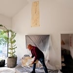 Visible mold growth behind paint