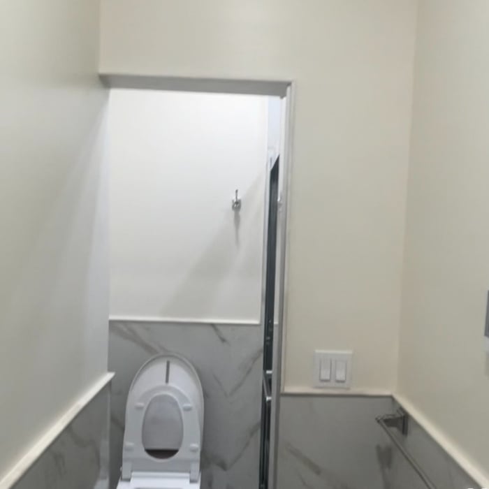 small bathroom half tiled, new floor tiles and wall tiles