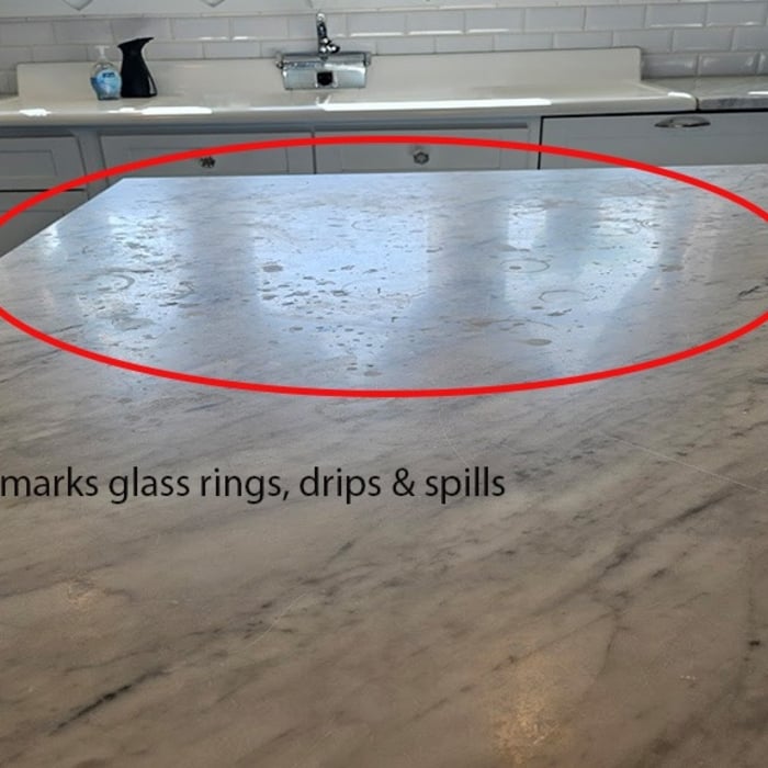 Here you can see several etch marks, (drips, dribbles, spills and drink ring marks)