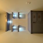 Custom cabinetry with floating shelves and electrical work done