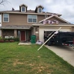 Beginning of day by removing old shingle, underlayment, drip edge, and pipe collars, while checking decking on roof good.