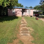 Felt paper and bundle of shingle on roof.