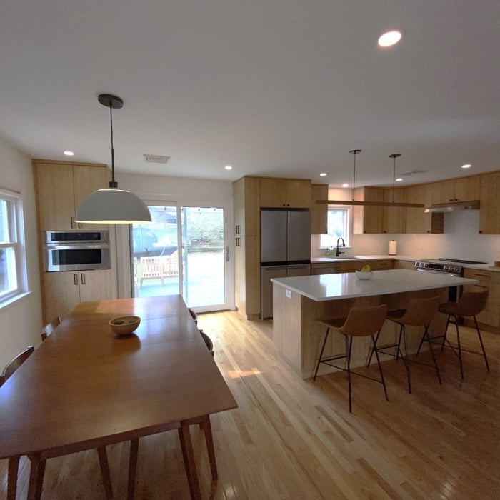 We removed the wall separating the Kitchen and Living room we created an open floor plan.