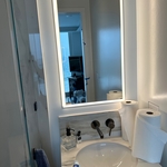 Light mirror in the bathroom