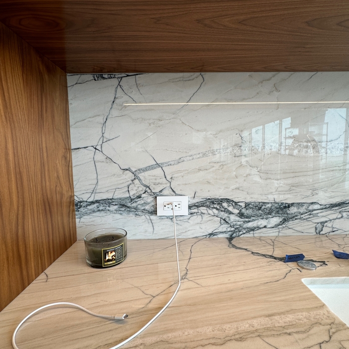 Under cabinet lighting with USBC-GFCI protected outlet