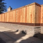 Retaining wall and board on board fencing