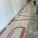 Company logo painted in warehouse